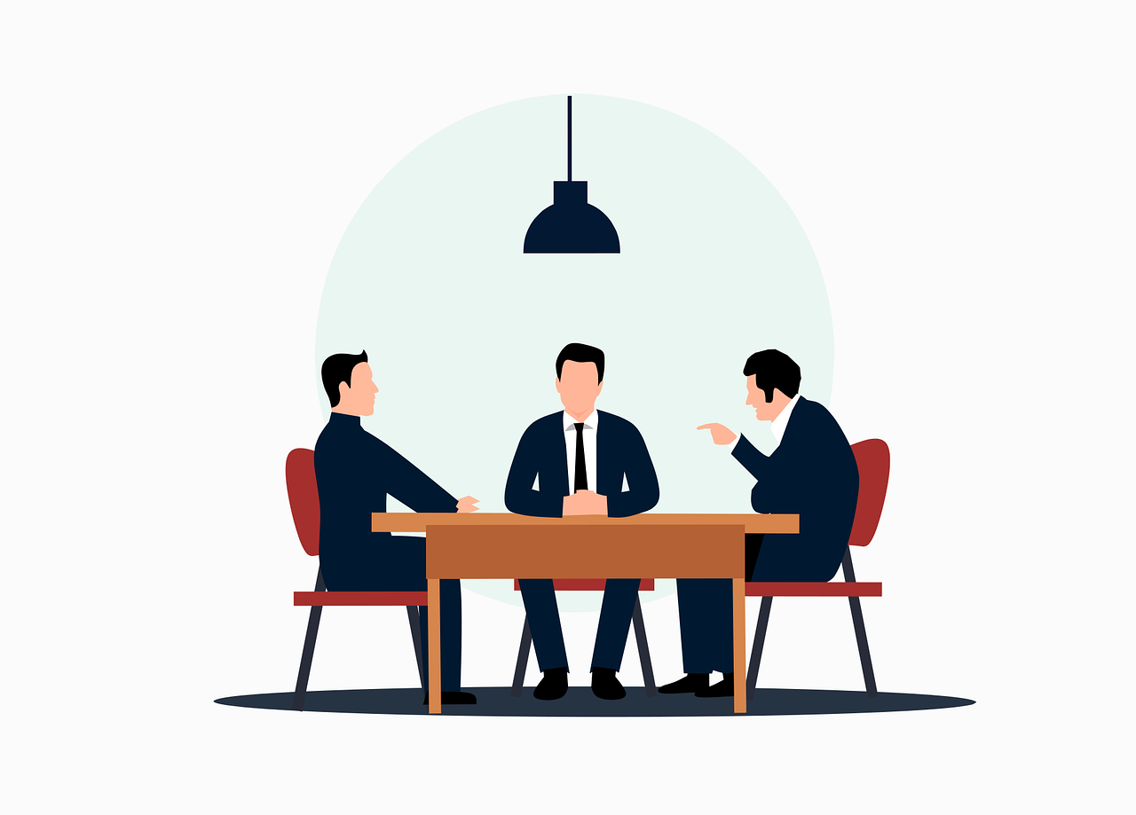 three men in an office